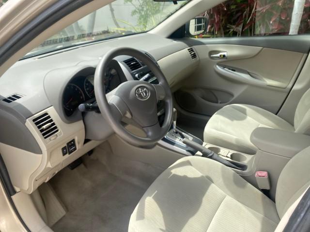 Photo of 2010 Desert Sand Mica Toyota Corolla