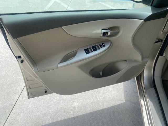 Photo of 2010 Desert Sand Mica Toyota Corolla