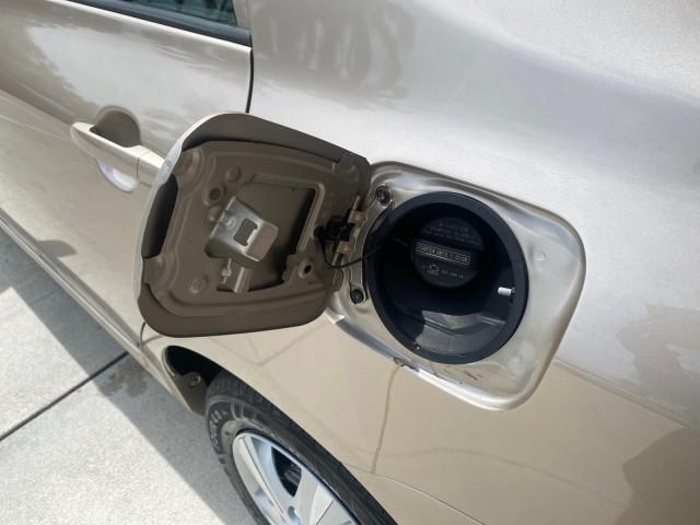 Photo of 2010 Desert Sand Mica Toyota Corolla