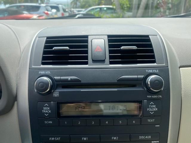 Photo of 2010 Desert Sand Mica Toyota Corolla