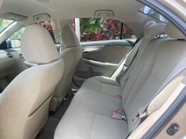 Photo of 2010 Desert Sand Mica Toyota Corolla