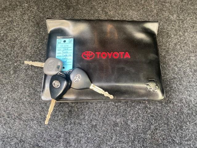 Photo of 2010 Desert Sand Mica Toyota Corolla