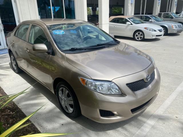 Photo of 2010 Desert Sand Mica Toyota Corolla