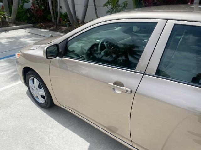 Photo of 2010 Desert Sand Mica Toyota Corolla