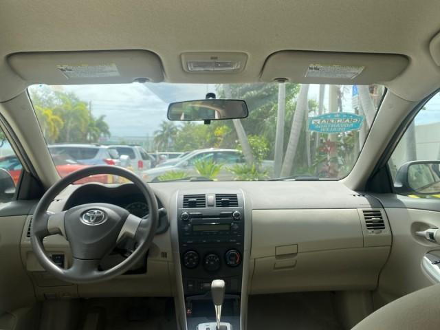 Photo of 2010 Desert Sand Mica Toyota Corolla
