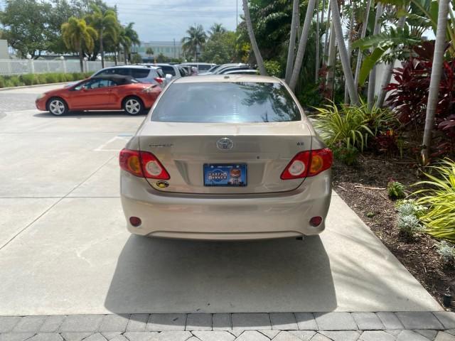 Photo of 2010 Desert Sand Mica Toyota Corolla