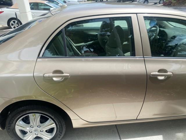 Photo of 2010 Desert Sand Mica Toyota Corolla