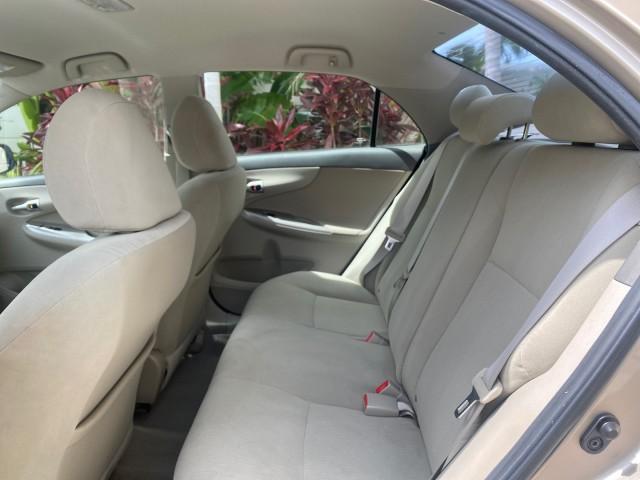 Photo of 2010 Desert Sand Mica Toyota Corolla