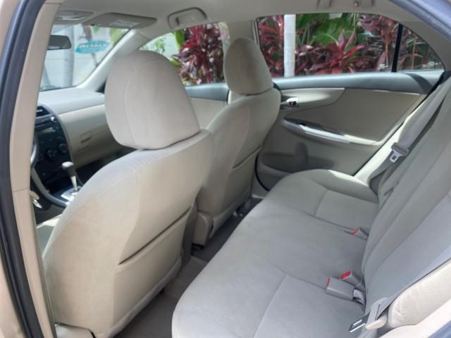 Photo of 2010 Desert Sand Mica Toyota Corolla
