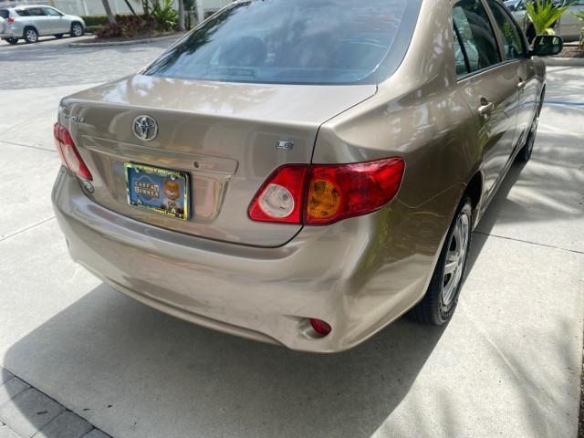 Photo of 2010 Desert Sand Mica Toyota Corolla