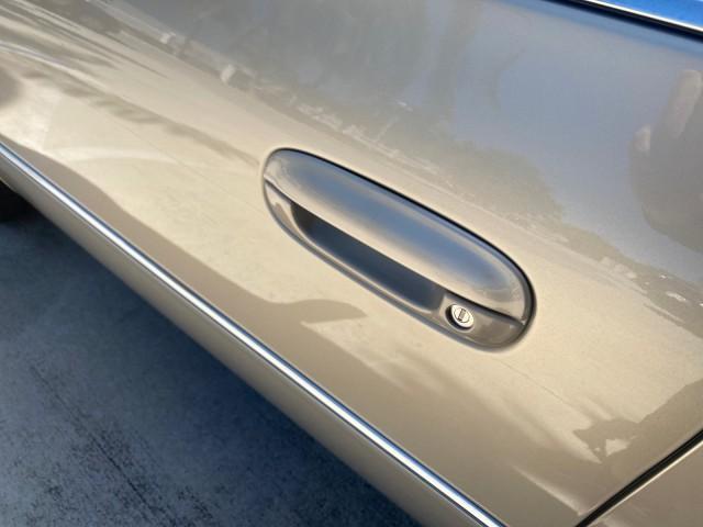 Photo of 2008 Gold Mist Cadillac DTS