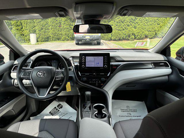Photo of 2023 Supersonic Red Toyota Camry