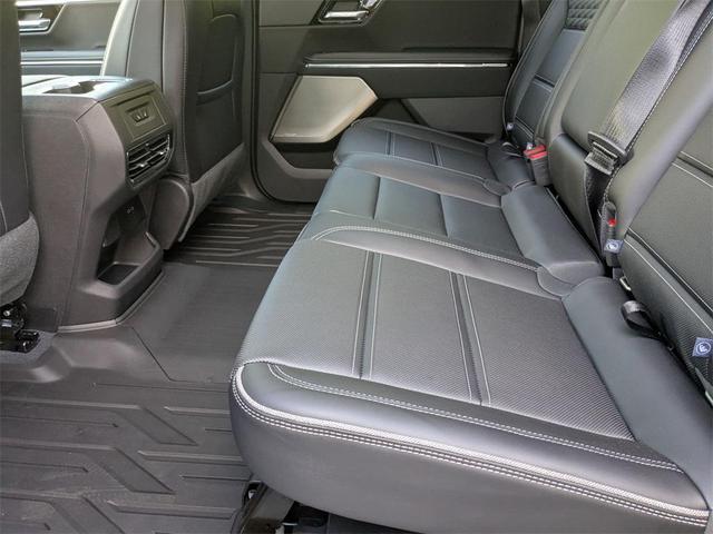 Photo of 2025 Summit White GMC Sierra EV
