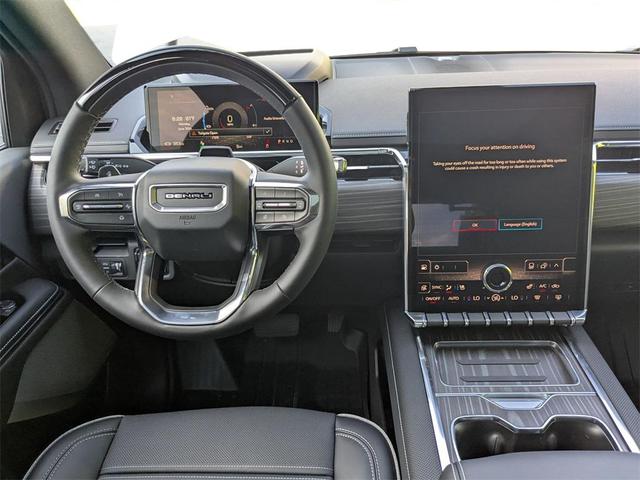 Photo of 2025 Summit White GMC Sierra EV