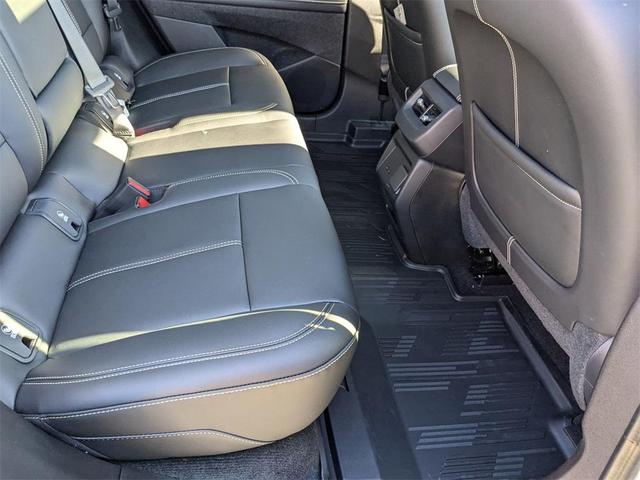 Photo of 2025 Crystal White Tricoat Cadillac OPTIQ