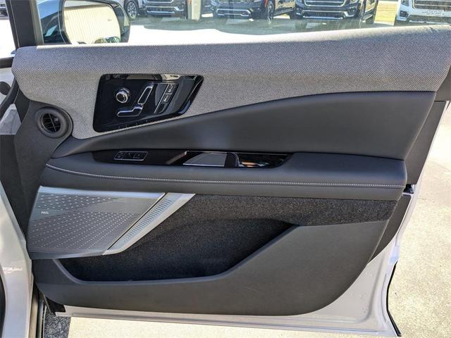 Photo of 2025 Crystal White Tricoat Cadillac OPTIQ
