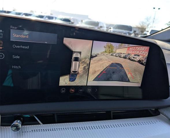 Photo of 2025 Crystal White Tricoat Cadillac OPTIQ