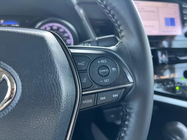 Photo of 2023 Midnight Black Metallic Toyota Camry