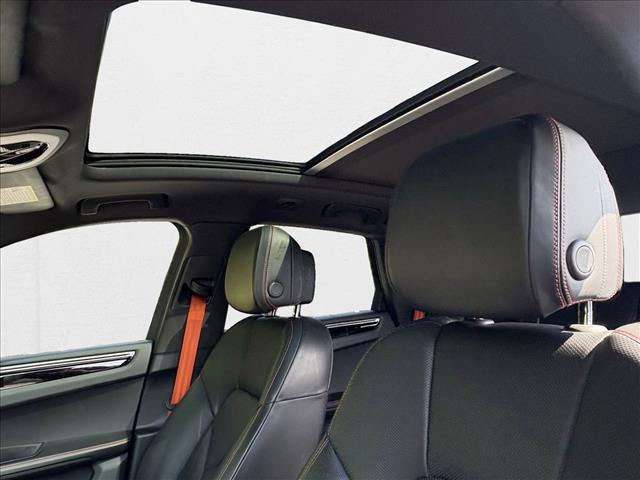 Photo of 2023 Papaya Metallic Porsche Macan