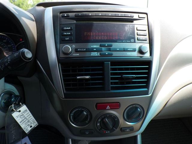 Photo of 2010 Camellia Red Pearl Subaru Forester