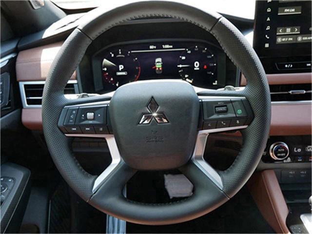 Photo of 2025 Red Diamond With Black Roof Mitsubishi Outlander