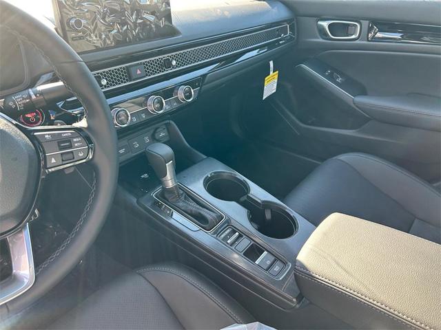 Photo of 2025 Solar Silver Metallic Honda Civic Hybrid