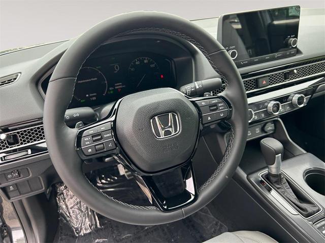 Photo of 2026 Gold Honda Civic Hybrid