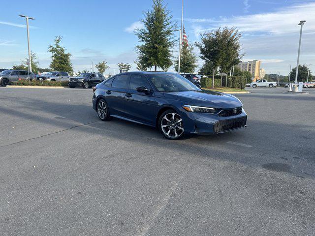 Photo of 2026 Blue Lagoon Pearl Honda Civic Hybrid