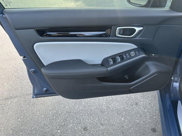 Photo of 2026 Blue Lagoon Pearl Honda Civic Hybrid
