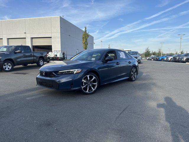 Photo of 2026 Blue Lagoon Pearl Honda Civic Hybrid
