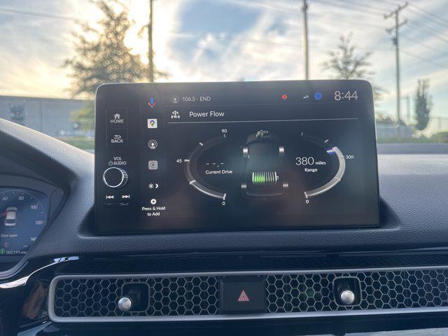 Photo of 2026 Blue Lagoon Pearl Honda Civic Hybrid