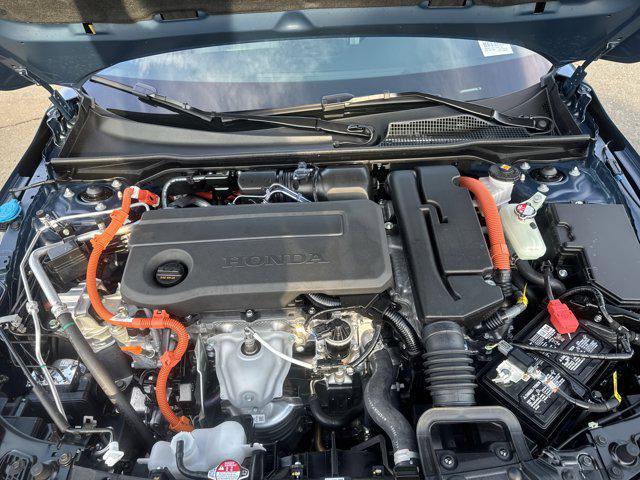 Photo of 2026 Blue Lagoon Pearl Honda Civic Hybrid