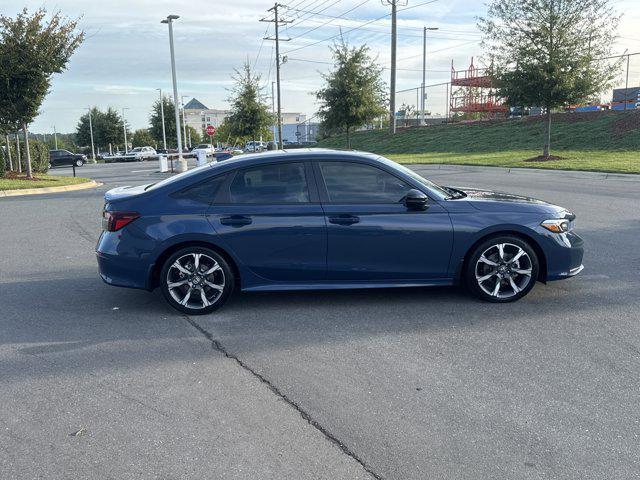 Photo of 2026 Blue Lagoon Pearl Honda Civic Hybrid