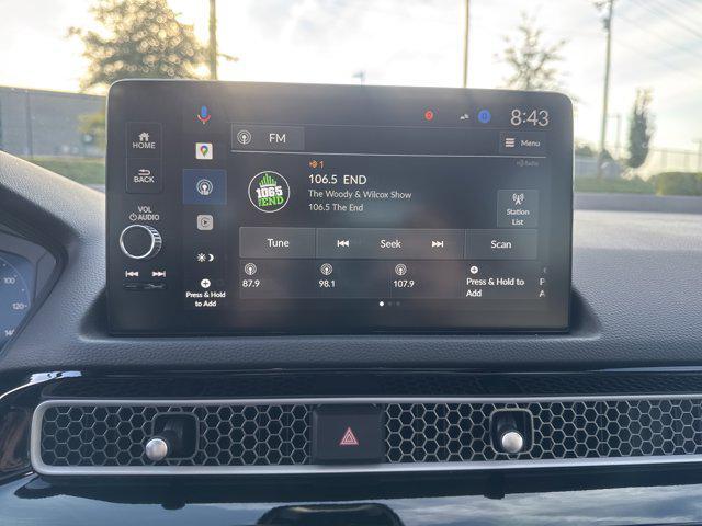 Photo of 2026 Blue Lagoon Pearl Honda Civic Hybrid