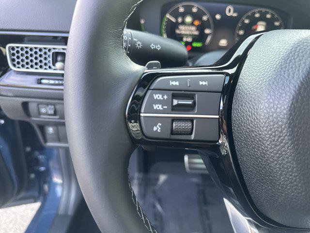 Photo of 2026 Blue Lagoon Pearl Honda Civic Hybrid