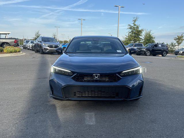 Photo of 2026 Blue Lagoon Pearl Honda Civic Hybrid