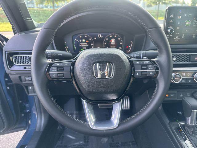 Photo of 2026 Blue Lagoon Pearl Honda Civic Hybrid