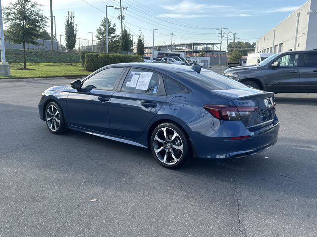 Photo of 2026 Blue Lagoon Pearl Honda Civic Hybrid