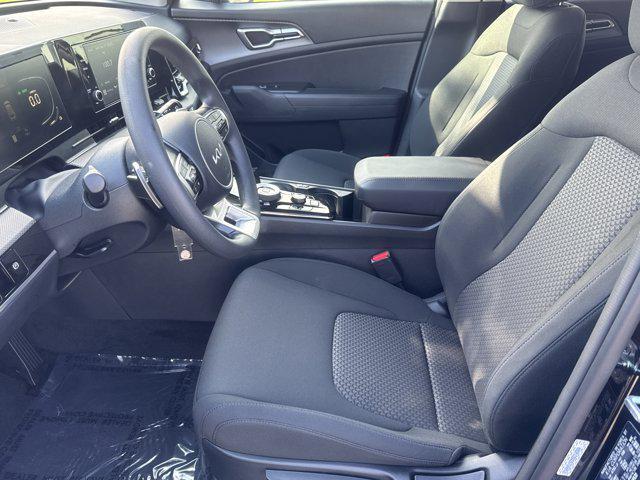 Photo of 2025 Fusion Black Kia Sportage Hybrid