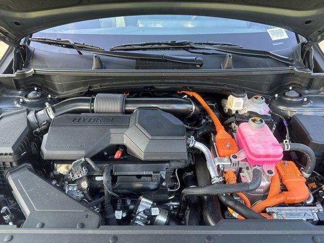 Photo of 2025 Fusion Black Kia Sportage Hybrid