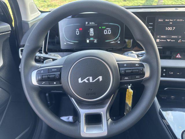 Photo of 2025 Fusion Black Kia Sportage Hybrid