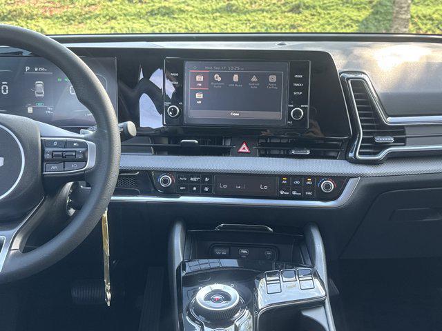 Photo of 2025 Fusion Black Kia Sportage Hybrid