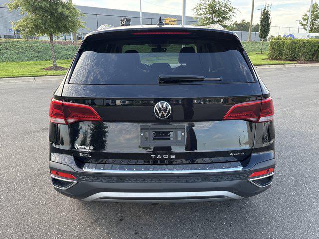 Photo of 2024 Deep Black Pearl Volkswagen Taos