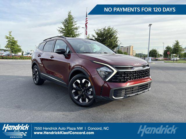 Photo of 2023 Dawning Red Kia Sportage