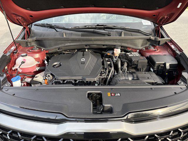 Photo of 2023 Dawning Red Kia Sportage