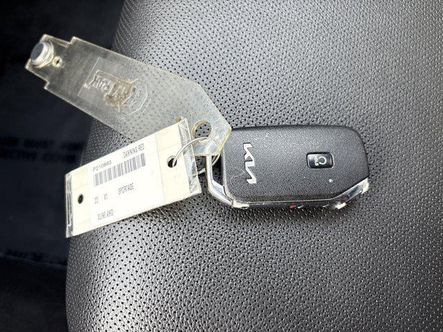 Photo of 2023 Dawning Red Kia Sportage