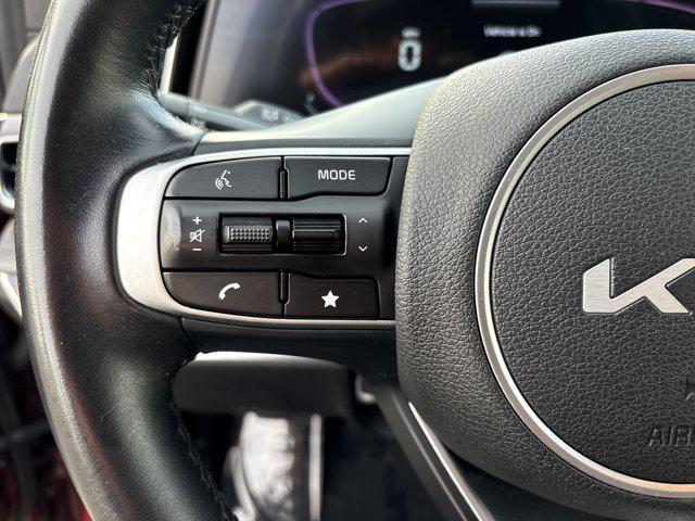 Photo of 2023 Dawning Red Kia Sportage
