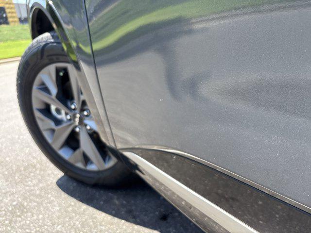 Photo of 2023 Gravity Gray Kia Sportage Hybrid