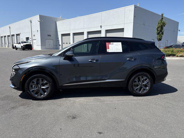 Photo of 2023 Gravity Gray Kia Sportage Hybrid