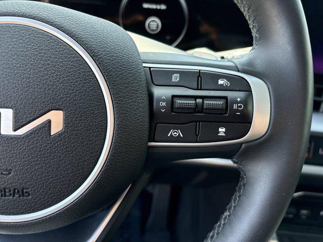 Photo of 2023 Gravity Gray Kia Sportage Hybrid